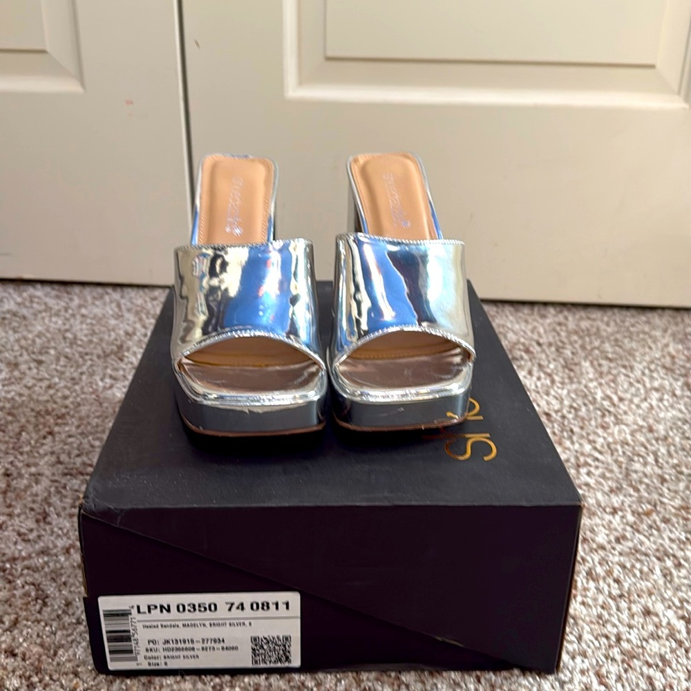 Silver, platform heels from Shoedazzel, size 6